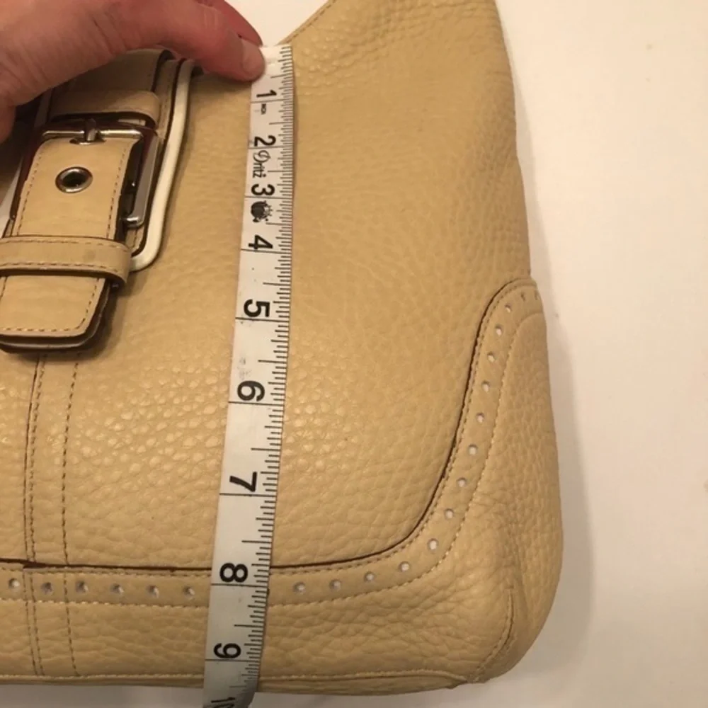Coach cream pebbled leather perforated hobo bag